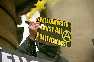 Small group of angry anti government anarchists stage a protest at Portland Place, London.