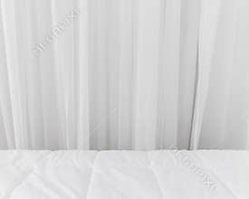 Bedding backdrops. White curtains fabric background