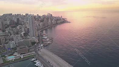 Sunset in the sea. Flying over Beirut Zaytunay bay marina and downtown. Drone aerial shot of Beirut, Lebanon, during sunset.