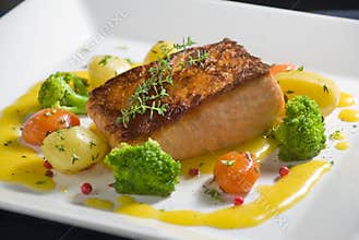 Grilled salmon dinner with vegetables