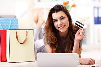 Pretty woman shopping online with credit card
