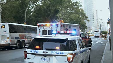 NEW YORK, USA, 18.08.2017 Accident. Emergency service on road. Ambulatory car riding near the police with siren light.