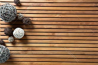 Natural decorative balls set on design wooden board for craftsmanship