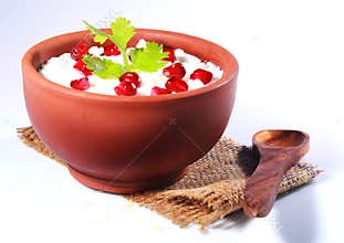 Homemade curd rice south indian food with pomegranate