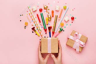 Birthday party background with gift and confetti