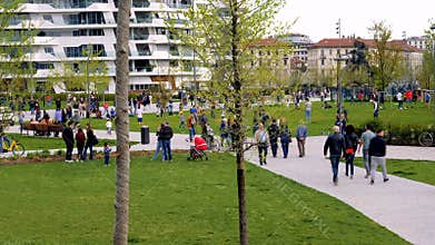 Timelapse of a city park with people and families 2