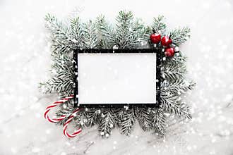 Christmas frame background with xmas tree and xmas decorations. Merry christmas greeting card, banner.