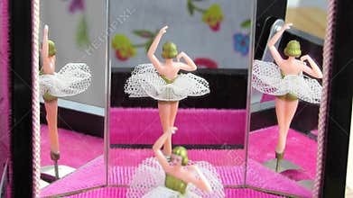 Jewellery box ballet dancer reflected in mirrors. Video.