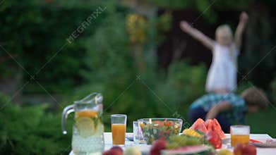 Children playing throw and catch game, healthy and fun activity outside, friends
