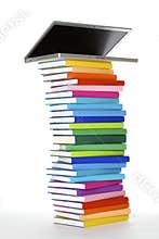 Laptop on book stack, side view