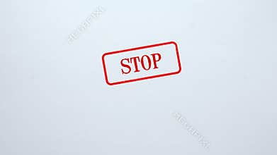 Stop seal stamped on blank paper background, prohibition, access denied, concept
