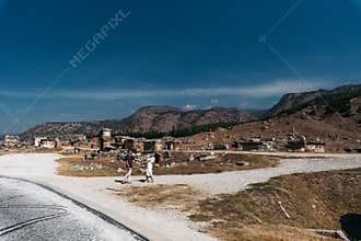 Tourists on excursions, ancient ruins