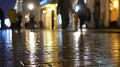 Rain city street night people