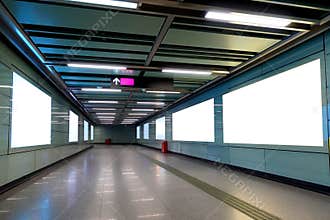 Blank billboard in subway station