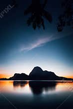 El Nido silhouette of beautiful Cadlao Island in dusk light after sunset in Palawan Island, Philippines