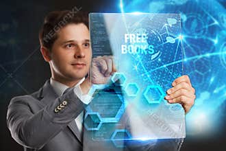 Business, Technology, Internet and network concept. Young businessman showing a word in a virtual tablet of the future: Free books