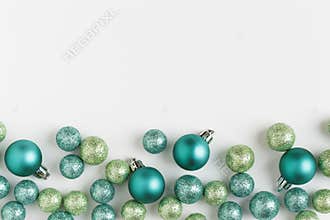 Beautiful, bright, modern Christmas holiday ornaments decorations horizontal border on white background