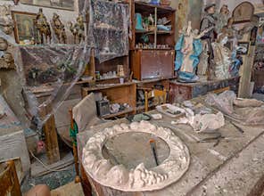 Artist work table with artwork and tools