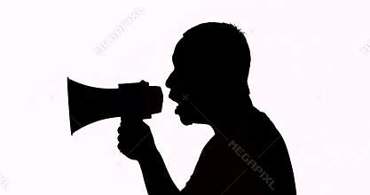 Silhouette of man speaking with megaphone