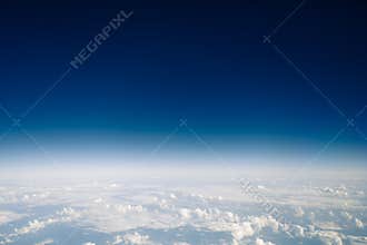 High sky above the clouds, blue atmosphere background