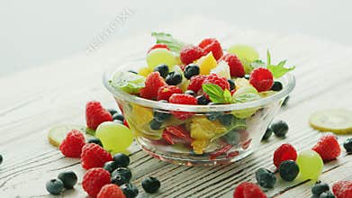 Bowl of fruit mix and berries