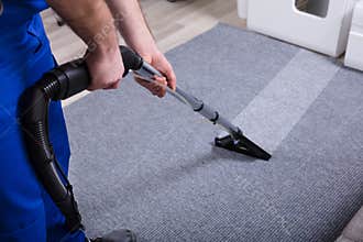 Janitor Cleaning Carpet