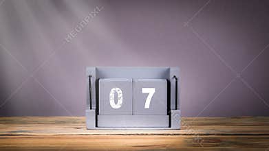 7 December. wooden calendar in motion