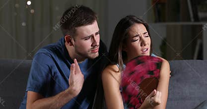 Couple suffering a heat stroke at home in the night