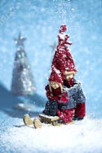 Christmas elves sledding in a fairy forest. Holiday concept, fun