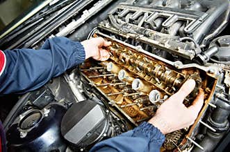 Machanic repairman at automobile car engine repair