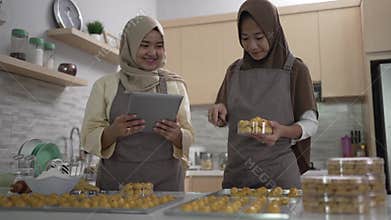muslim small business owner making homemade nastar snack to sel