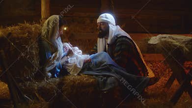 Joseph speaking with Mary after birth of Jesus