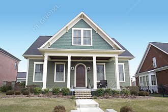 Green Cape Cod Style House