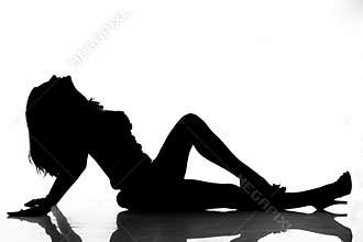 Silhouette of lying woman