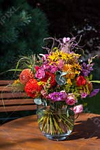 Floral summer bouquet, bunch of flowers, colorful flowers, dahlias, roses, tickseed, snapdragon flowering arrangement. Still life