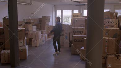 Volunteer prepare boxes of EU humanitarian aid for Ukrainian citizens.