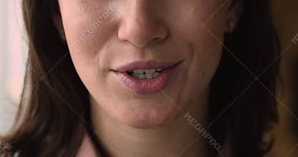 Happy 30s woman moving lips talking speaking, close up.
