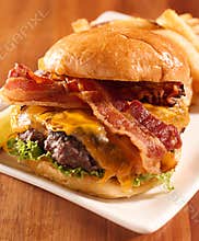 Bacon cheeseburger served openfaced