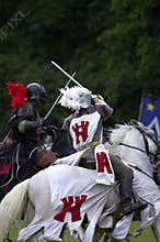 Knights jousting warwick castle England uk