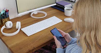 Young girl using smartphone studying browsing internet, schoolgirl, children homeschooling, online education