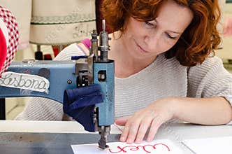 Woman tailor, fabric sewing, female sewing