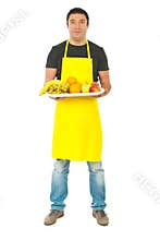 Full length of greengrocer with fruits