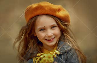 Smiling girl portrait with  flowers