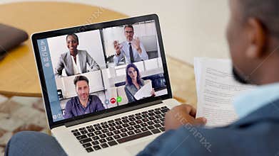 Black businessman working from home in video conference