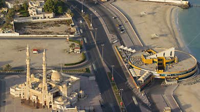 Cityscape of Ajman from rooftop morning after sunrise timelapse. Ajman is the capital of the emirate of Ajman in the
