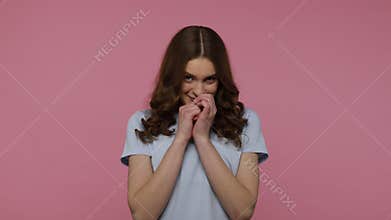 Girl points finger to camera, surprised by unexpected result