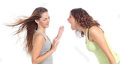 Woman shouting angry to another one