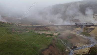 Drone areal video of empty geothermal Krysuvik area on Reykjanes peninsula in Iceland on early summer morning. Visible