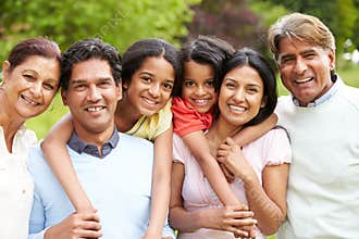 Muti-Generation Indian Family Walking In Countryside