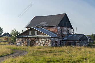 An ancient house made of stones, bricks and wood. Solovetsky Islands